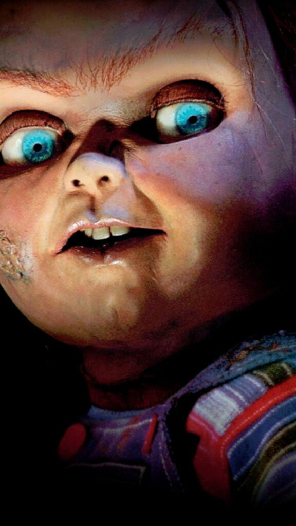 Terrifying Screen Scream: Chucky Haunts Your iPhone in HD Horror Wallpaper