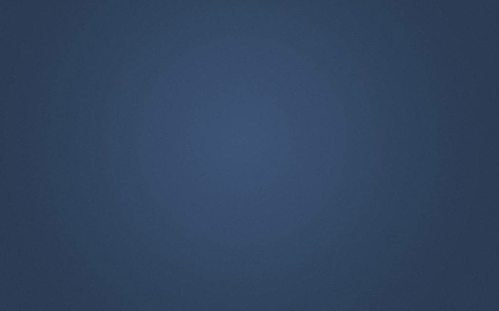 Serene Simplicity: Embracing the Calm of Dark Denim Blue Wallpaper