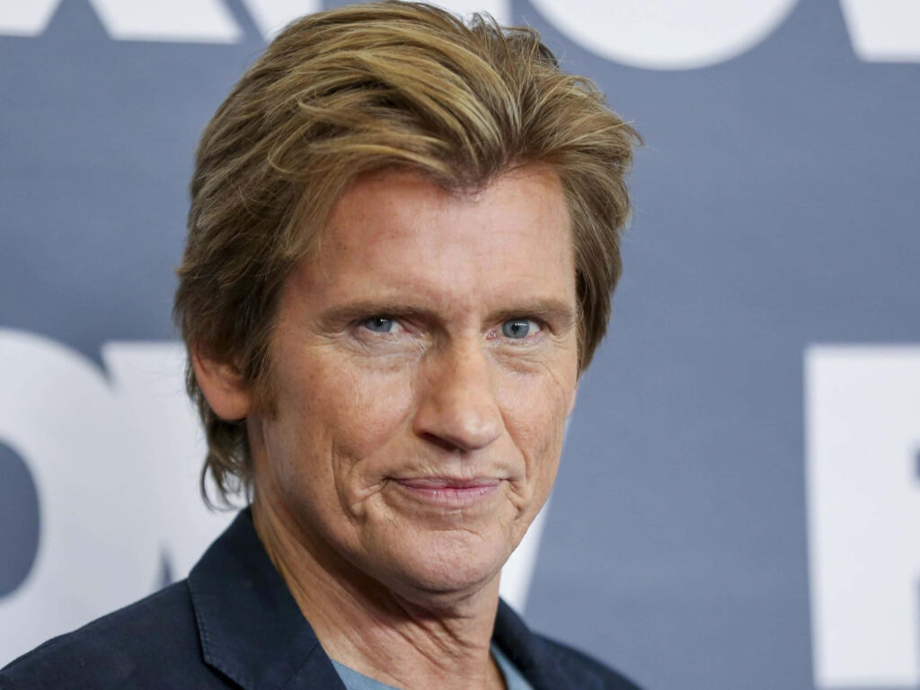 Denis Leary closeup portrait wallpaper with confident expression cool tones blurred background