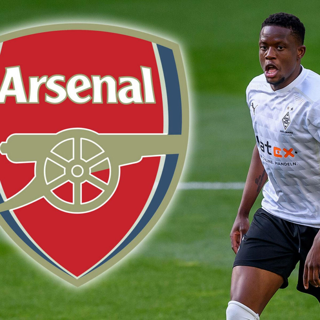 Denis Zakaria in action with bold red and white Arsenal logo football wallpaper background