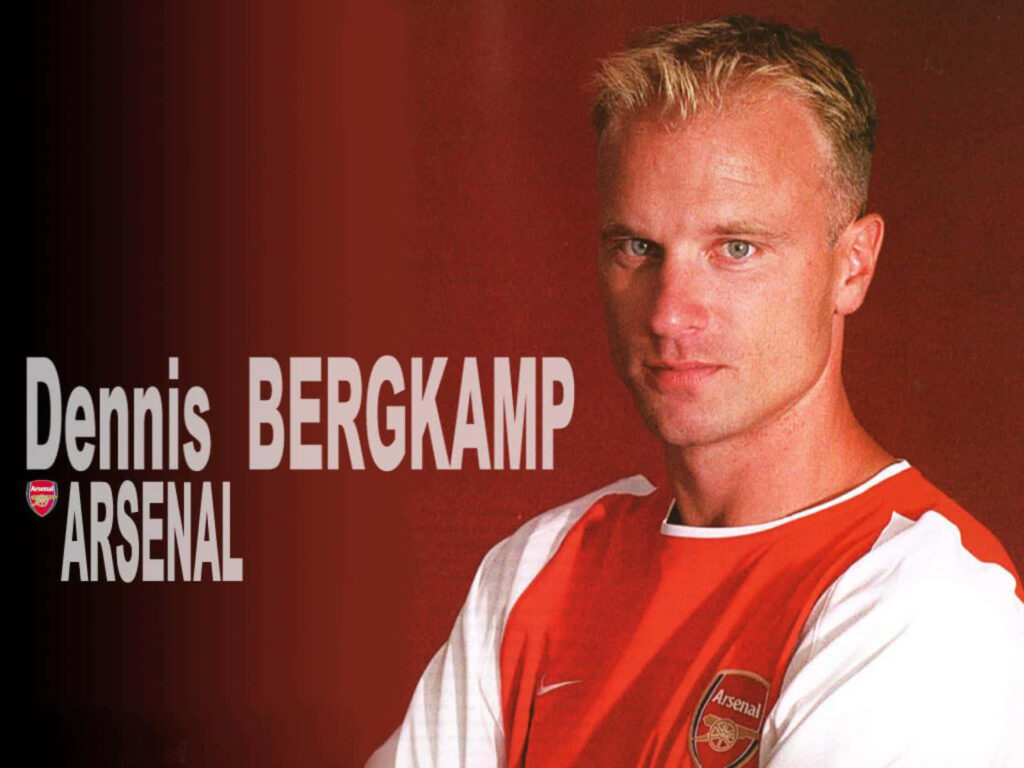 Dennis Bergkamp Arsenal FC wallpaper close-up focused expression maroon background classic style