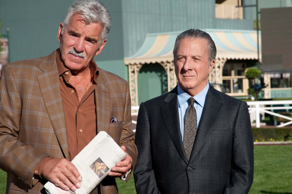 Dennis Farina and Dustin Hoffman in sharp suits at racetrack scene from HBO drama Luck wallpaper