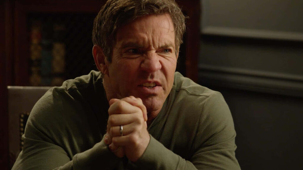 Dennis Quaid intense candid portrait in green crewneck with dark dramatic background wallpaper