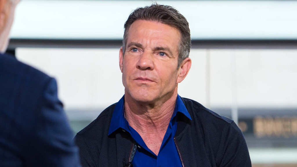 Dennis Quaid smiling warmly in dark jacket and blue shirt high resolution wallpaper background