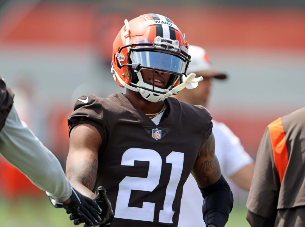 Denzel Ward Cleveland Browns number 21 handshake at Berea Training Camp intense sunlight action Wallpaper