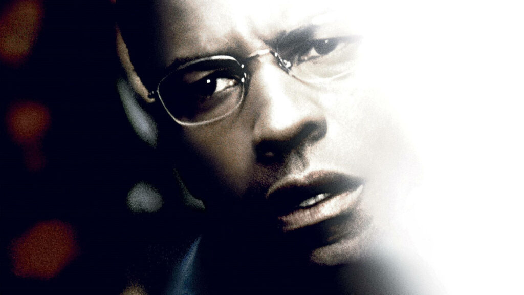 Denzel Washington intense close-up from The Manchurian Candidate with dramatic lighting wallpaper
