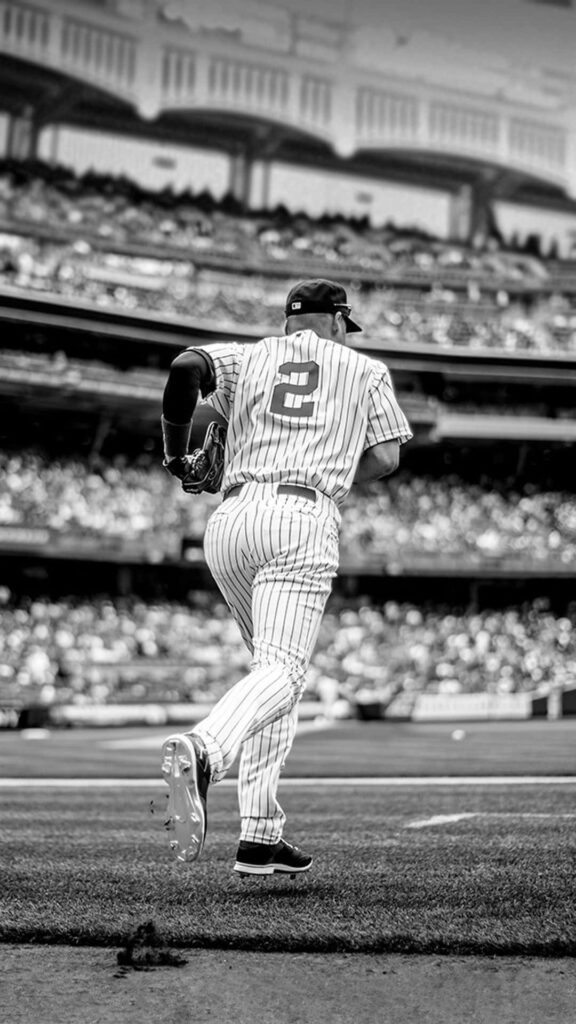Derek Jeter running onto baseball field black and white wallpaper showing number 2 pinstripe jersey