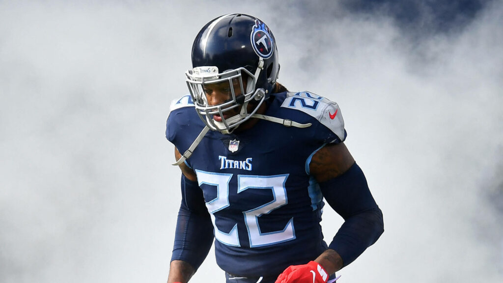 Derrick Henry Tennessee Titans wallpaper intense smoke dramatic blue white sports photography background
