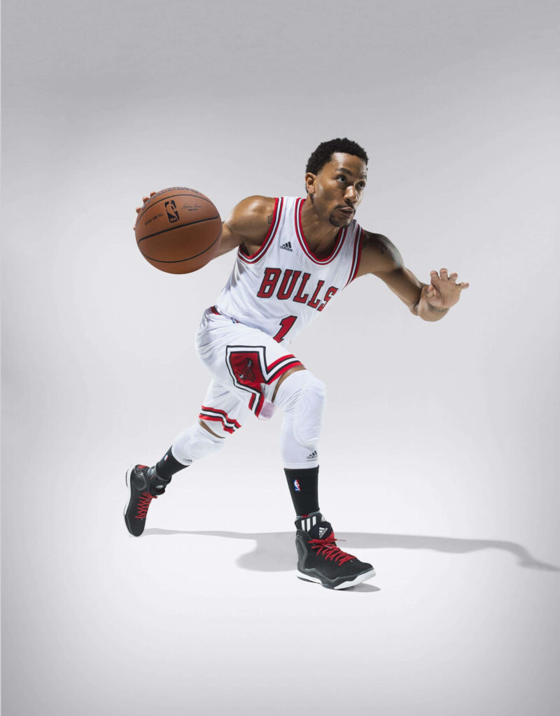 Derrick Rose Chicago Bulls driving basketball intense focus high definition dynamic wallpaper