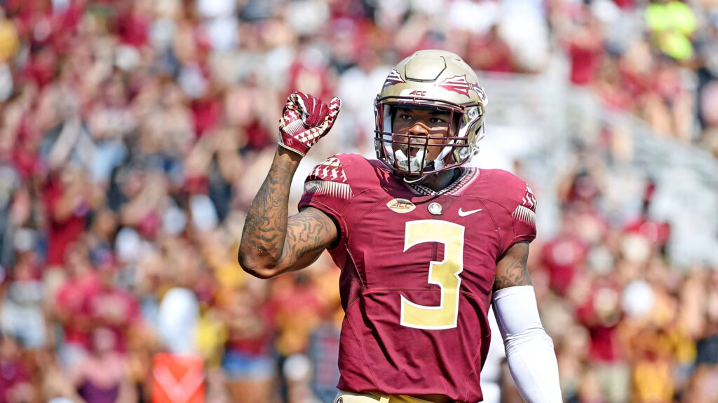 Derwin James Jr. in Florida State Seminoles uniform confident on field garnet and gold colors Wallpaper