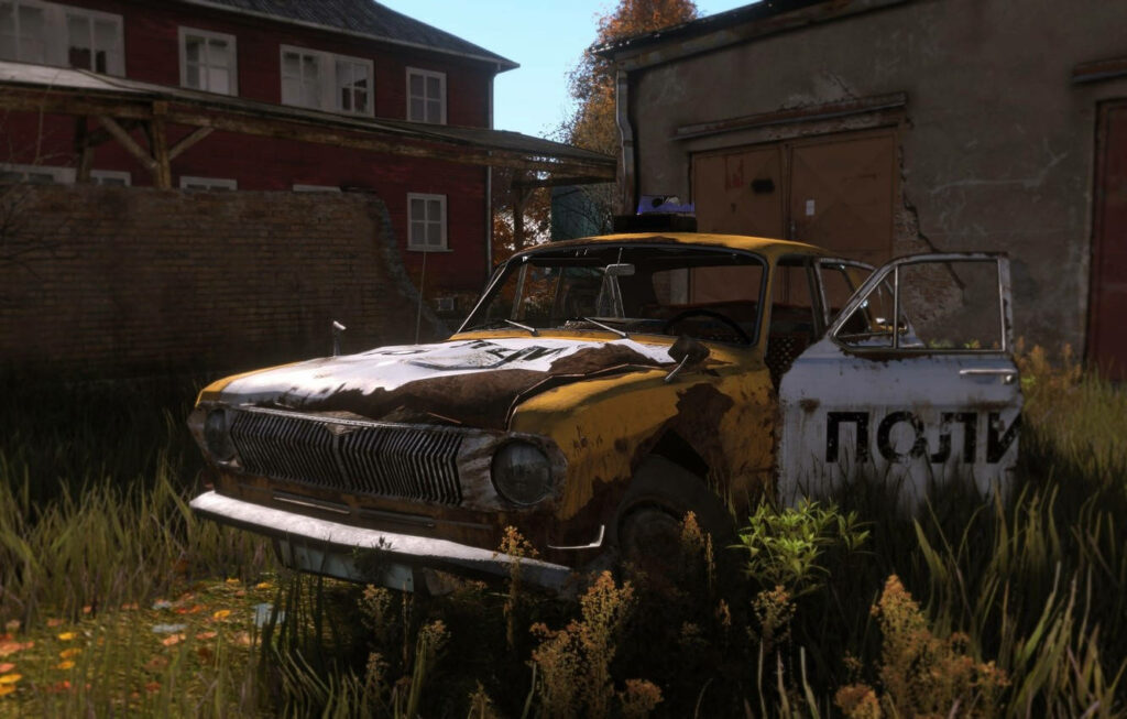 Desolate Remnants: Decaying Yellow Taxi Amidst Post-Apocalyptic Abandonment in 'DayZ' Game World Wallpaper