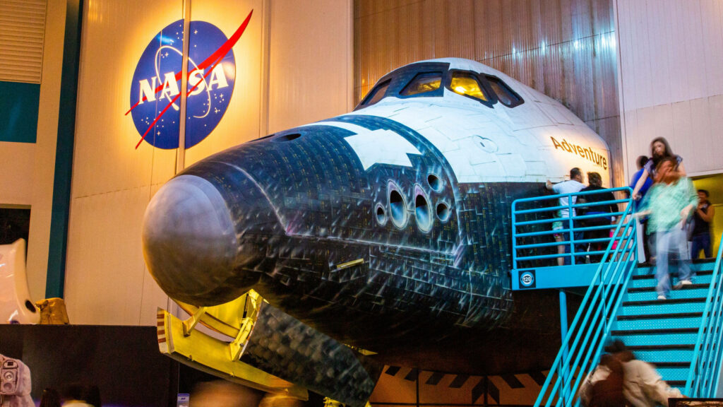 NASA's Aircraft Model Wallpaper: Visitors Explore Houston Exhibit