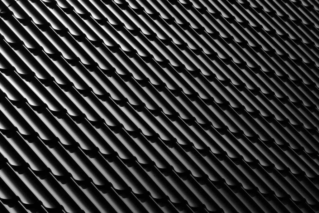Textured Black and White Roof Tiles Wallpaper Background Design