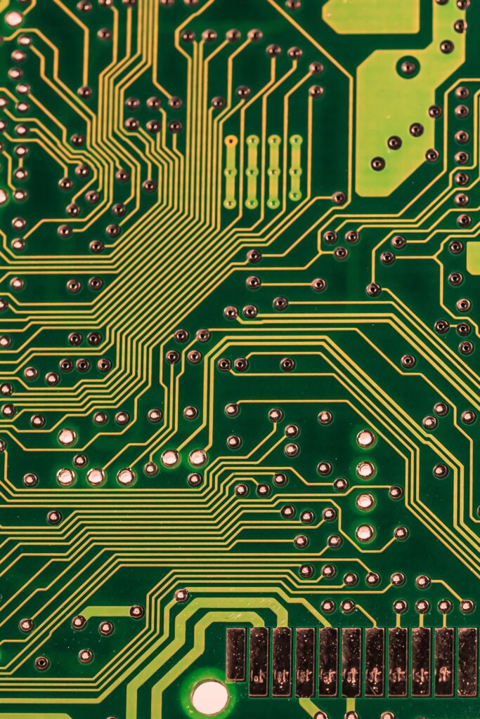 Intricate Green PCB Wallpaper: Gold Pathways & Microcircuits