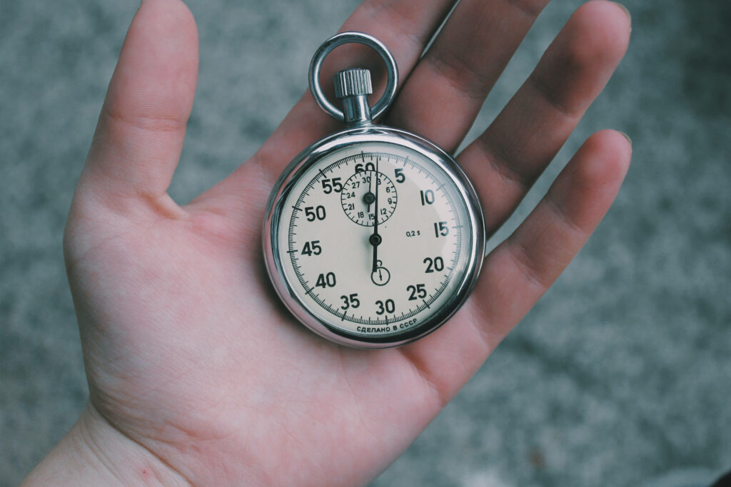 Craftsmanship in Time: Close-Up Stopwatch Wallpaper Background