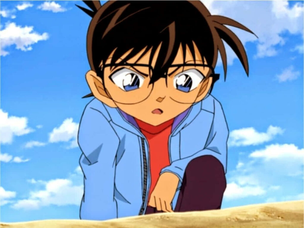 Detective Conan Wallpaper: Focused Expression Under a Bright Sky