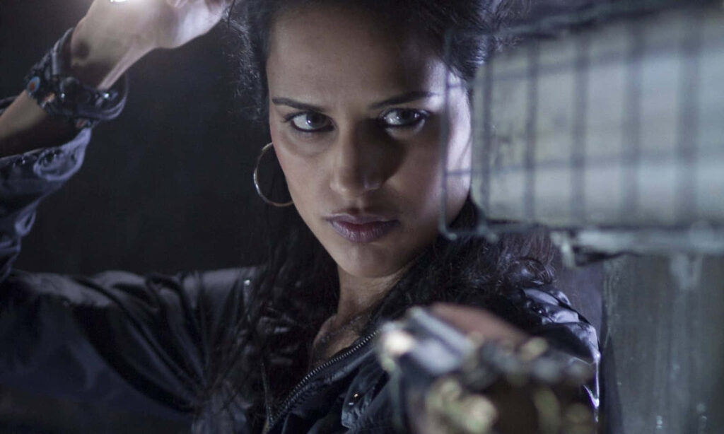 Determined Agam Darshi in dramatic intense scene focused confident wallpaper background