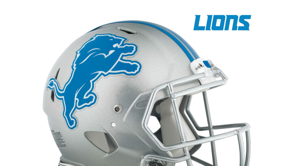 Detroit Lions football helmet close-up silver blue lion logo modern metallic finish wallpaper