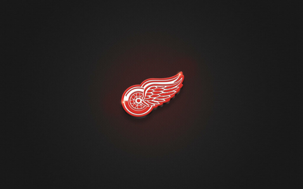 Detroit Red Wings logo on dark textured background with subtle red glow hockey wallpaper