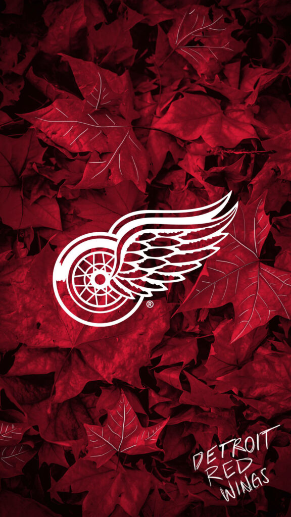 Detroit Red Wings logo in white over vibrant red autumn leaves background hockey wallpaper