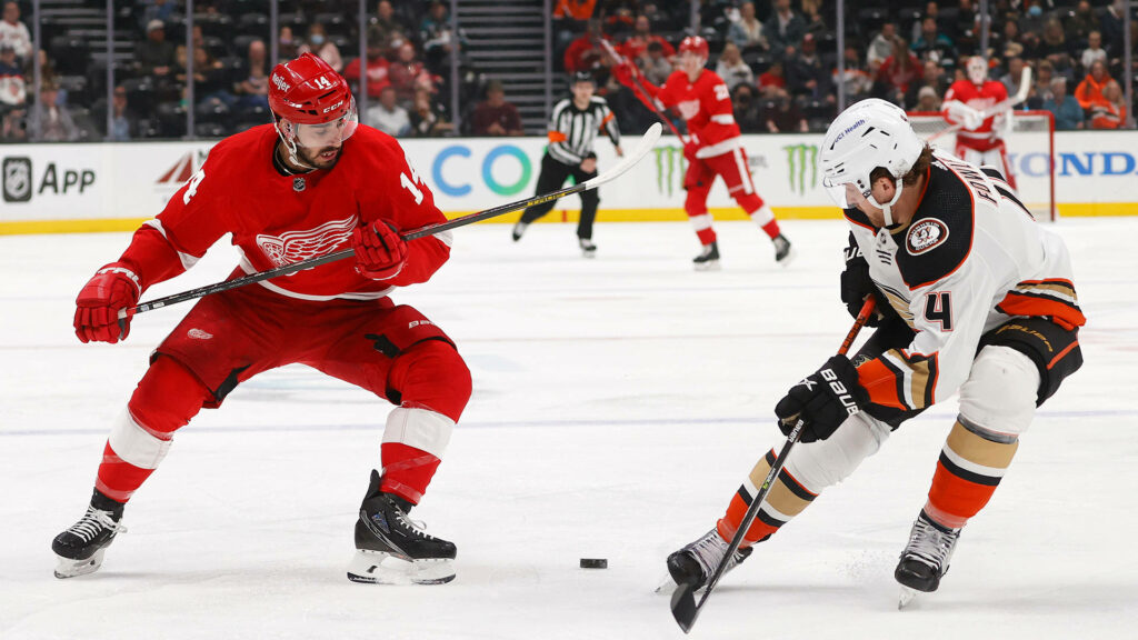 Detroit Red Wings and Anaheim Ducks players battle for the puck with Cameron Fowler in action Wallpaper