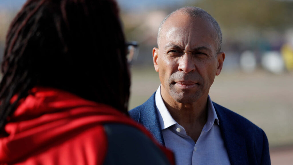 Deval Patrick outdoors candid portrait focused thoughtful expression natural light wallpaper background