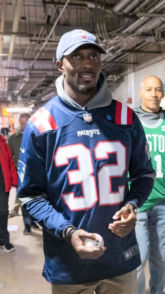 Devin McCourty in New England Patriots jersey number 32 calm focused NFL star wallpaper background