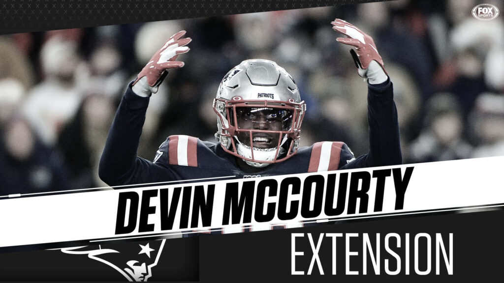 Devin McCourty intense NFL action Patriots uniform dynamic wallpaper background on field