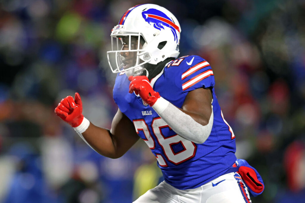Devin Singletary Buffalo Bills running back in blue red uniform action NFL stadium wallpaper