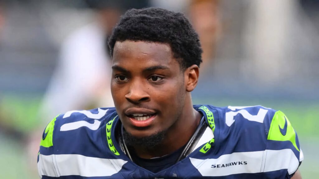 Devon Witherspoon in Seattle Seahawks uniform vibrant football wallpaper high resolution game intensity