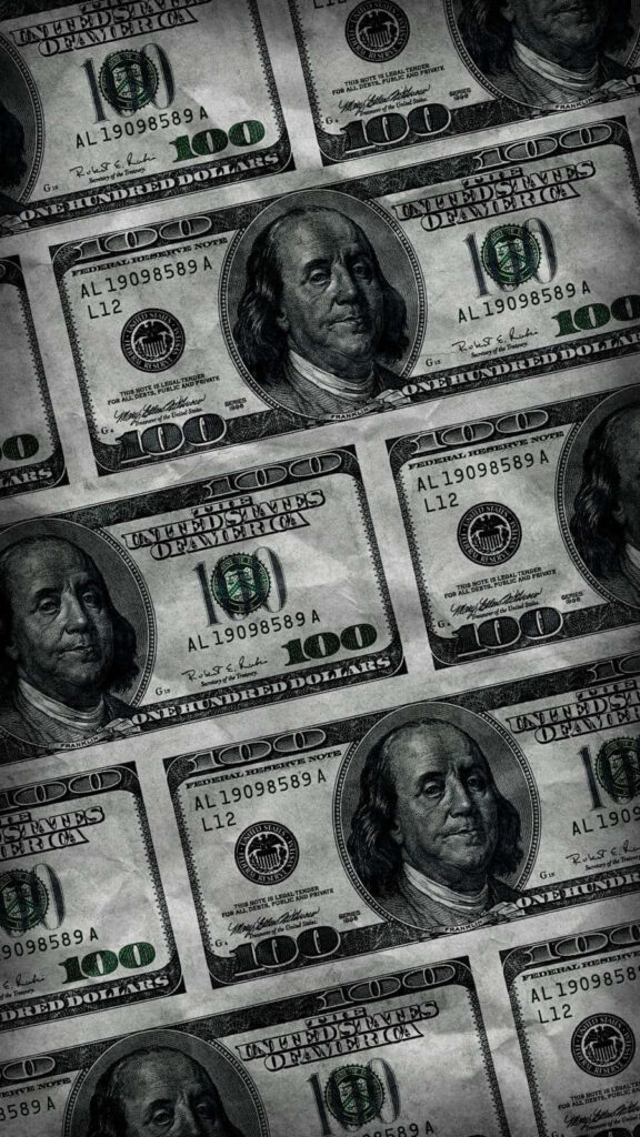 Seamless diagonal pattern of detailed one hundred dollar bills featuring Benjamin Franklin design Wallpaper