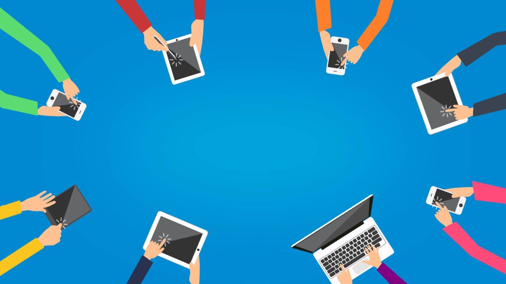 Multiple hands using smartphones tablets and laptop in a circle on blue gradient tech background Wallpaper