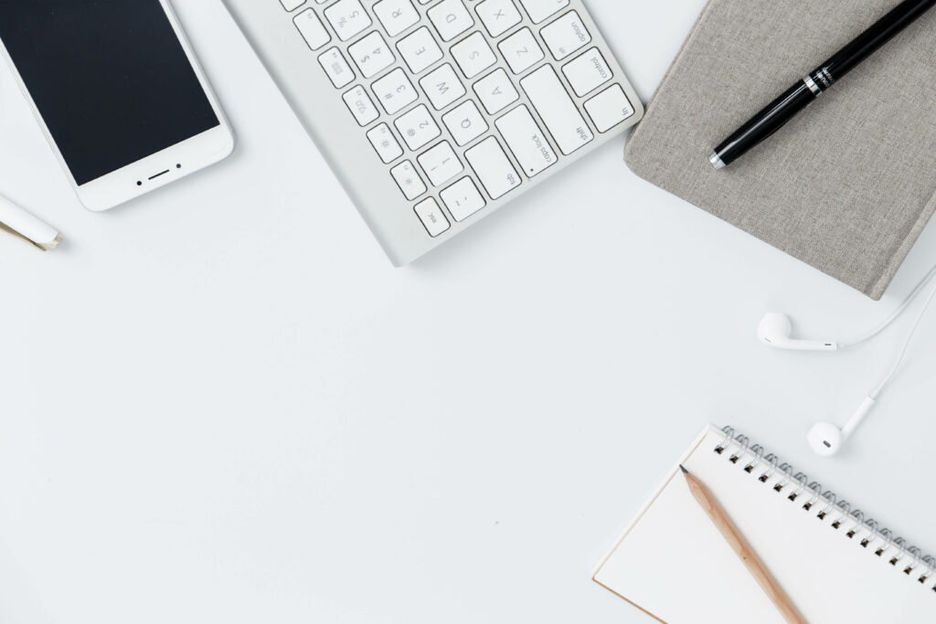 Uncluttered Blogging Essentials Set on a Clean Canvas - Professional Blogging Workspace Wallpaper