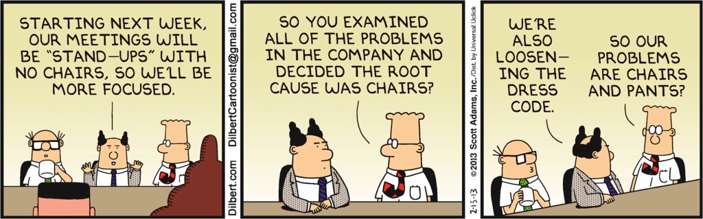 Dilbert comic wallpaper satirizing office meeting with no chairs and relaxed dress code in pastel colors