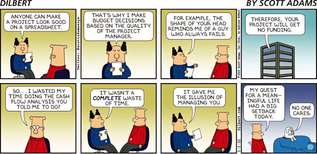 Dilbert comic wallpaper showing office satire on project management and funding challenges