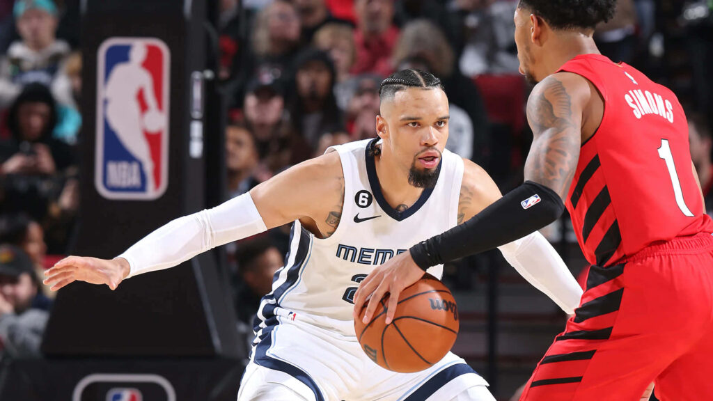 Dillon Brooks defends Anfernee Simons Memphis Grizzlies vs Portland Trail Blazers NBA action wallpaper