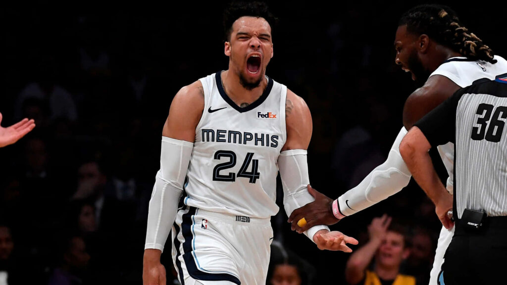 Dillon Brooks Memphis basketball player intense celebration during game dynamic court action Wallpaper