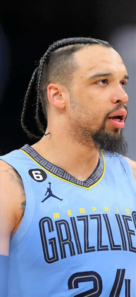 Dillon Brooks Memphis Grizzlies basketball action close-up focused expression vibrant colors wallpaper