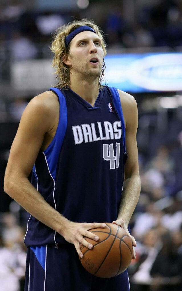 Dirk Nowitzki in Dallas Mavericks jersey 41 intense basketball portrait wallpaper background