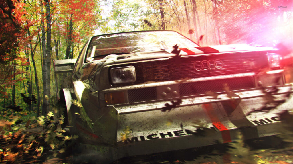 Dirt 3 Audi Rally Car Racing Through Autumn Forest in Dynamic Scene Wallpaper
