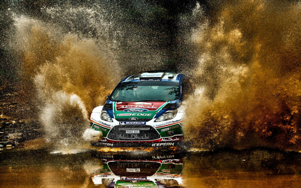 Dirt rally car splashing muddy water in off-road race capturing speed adrenaline and action Wallpaper