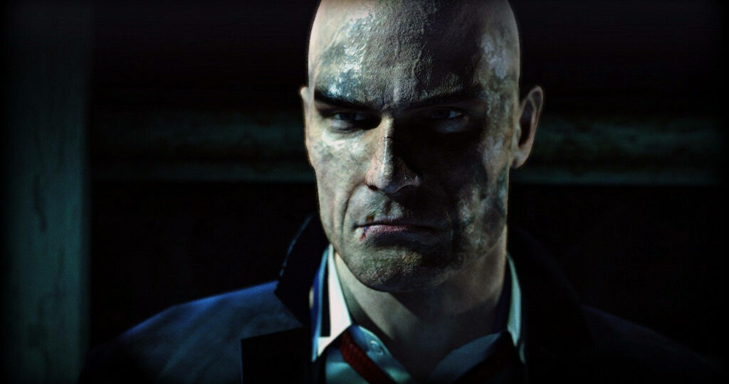 Dirty Assassin: A Gritty Depiction of Agent 47 from Hitman Absolution Wallpaper