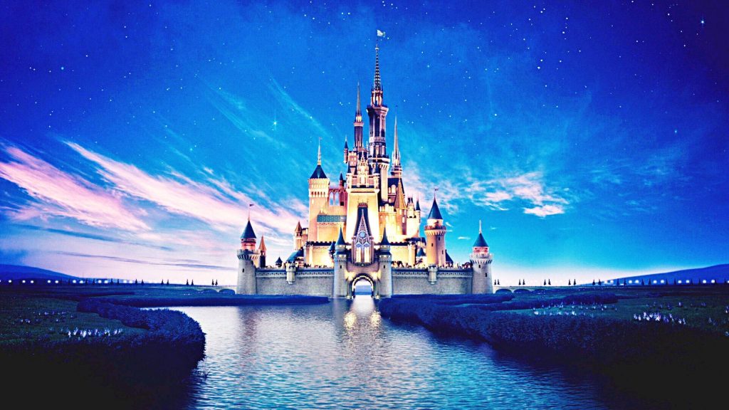 Disney World Cinderella Castle glowing at twilight reflecting in moat magical desktop wallpaper