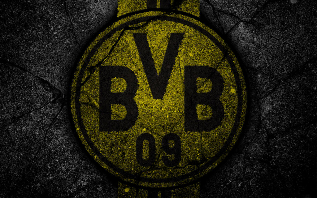 Worn Borussia Dortmund BVB 09 logo on distressed yellow background football wallpaper background