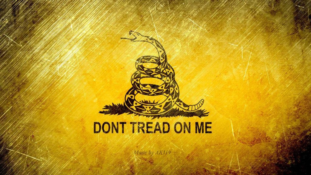 Distressed Gadsden flag wallpaper with coiled rattlesnake and bold Dont Tread On Me motto background
