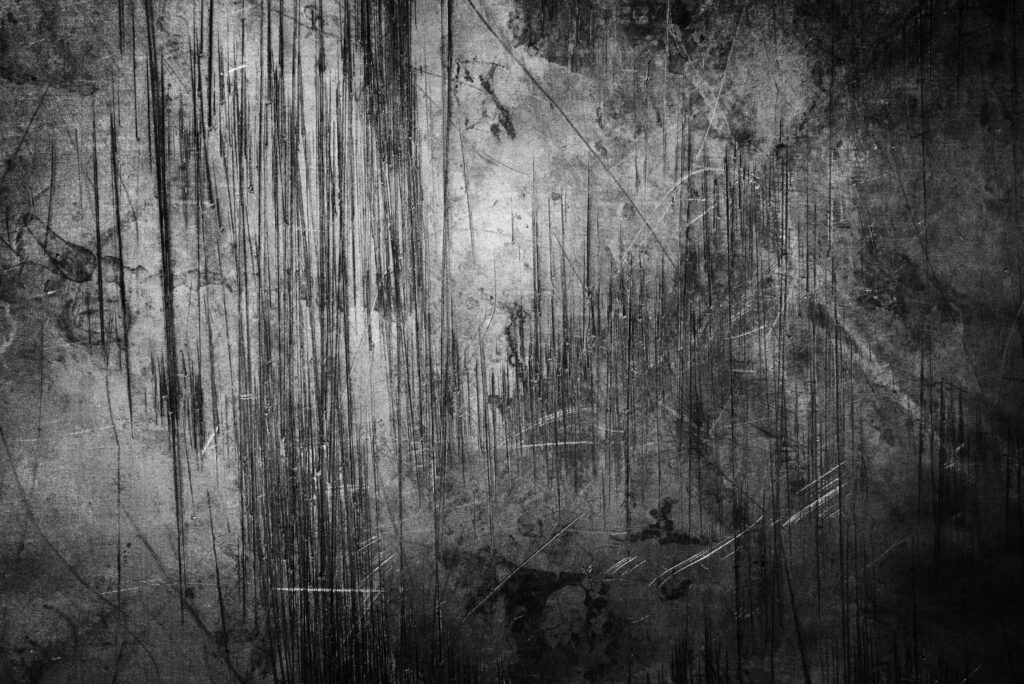 Distressed Metal Surface Close-Up: Rugged Textures for Wallpaper