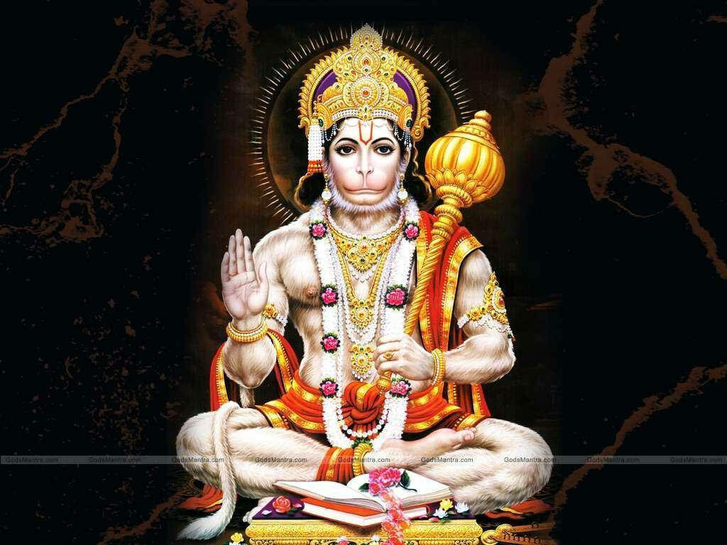Divine Power: Hanuman Ji Sitting Strong Amidst Blackness Wallpaper