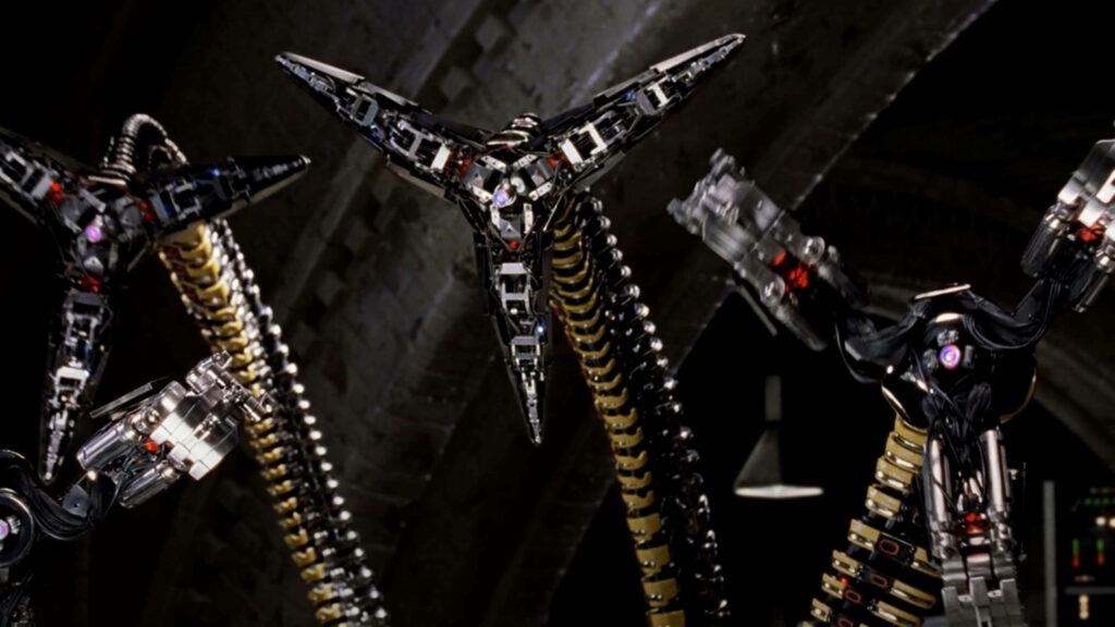 Doctor Octopus metallic tentacles close up with detailed mechanical claws on dark industrial background Wallpaper