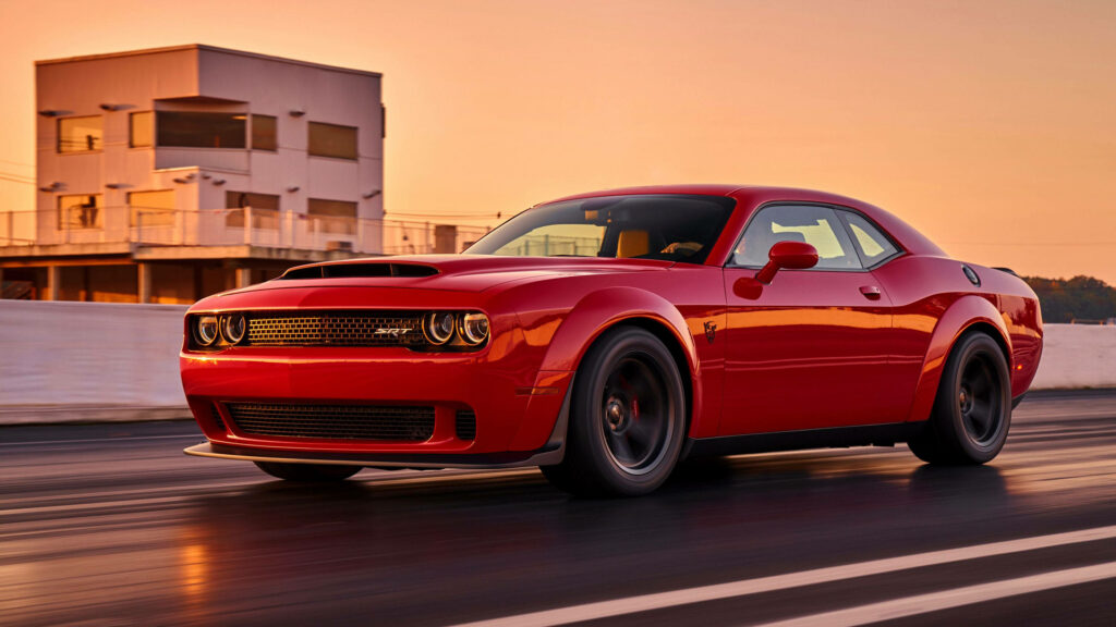 Dodge Challenger SRT Demon 10 red muscle car on drag strip sunset high-performance wallpaper background