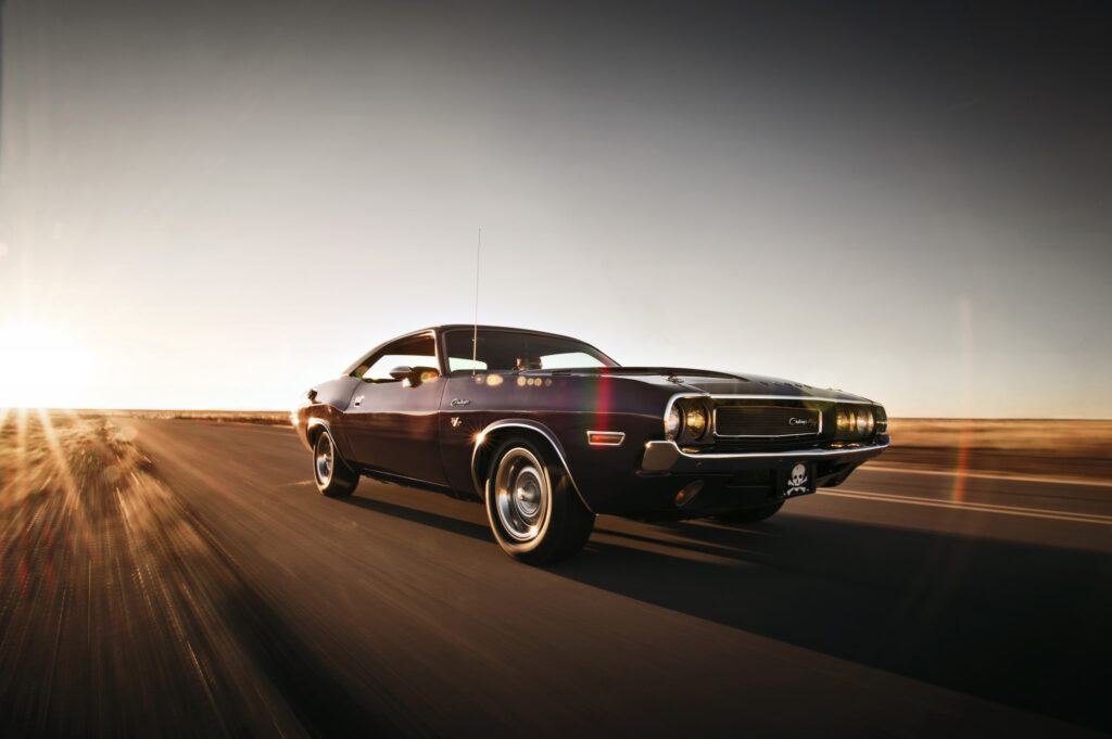 Dodge Challenger Under Sunlight: Speed & Style Wallpaper Background
